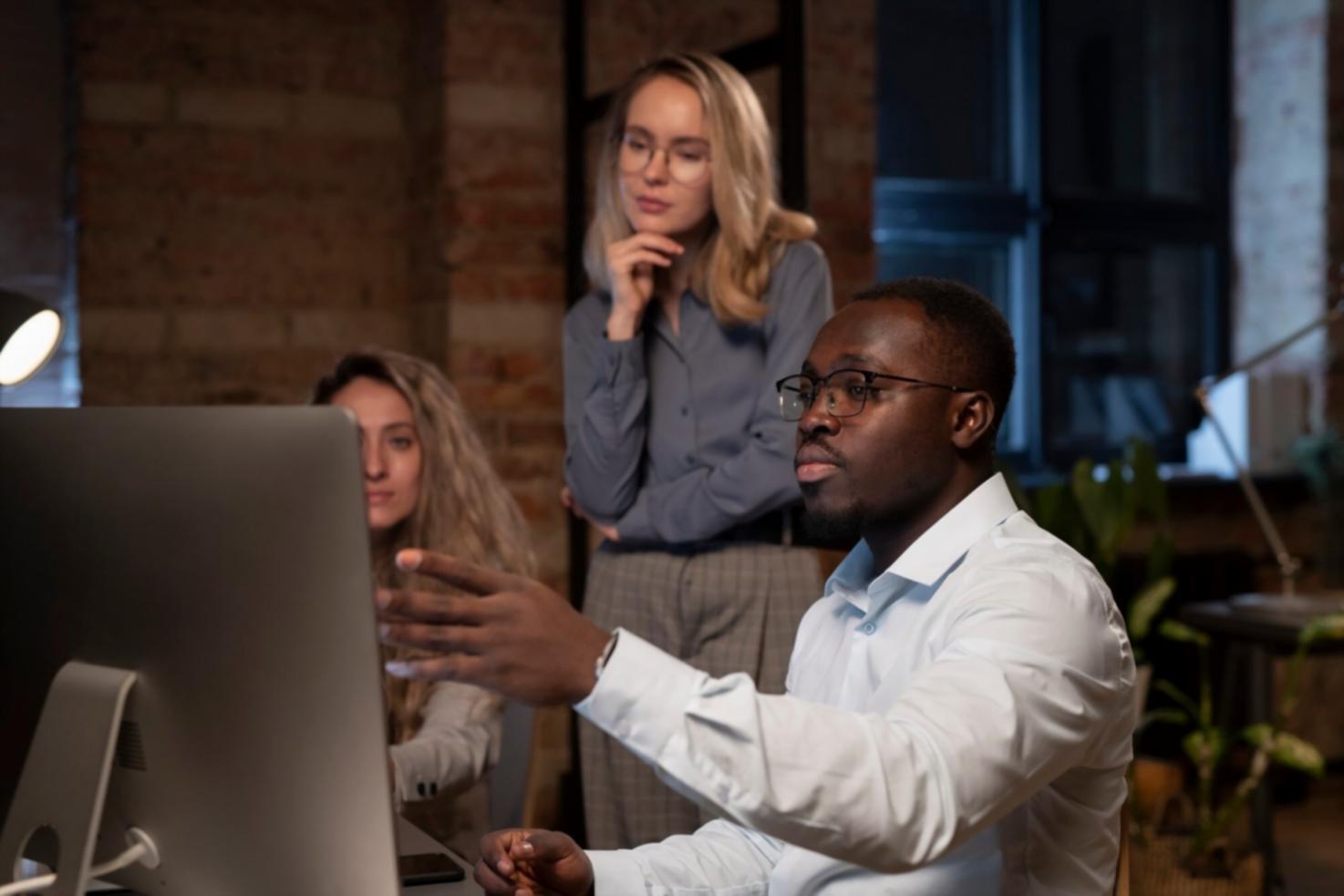 Business professionals in workshop setting learning financial analysis